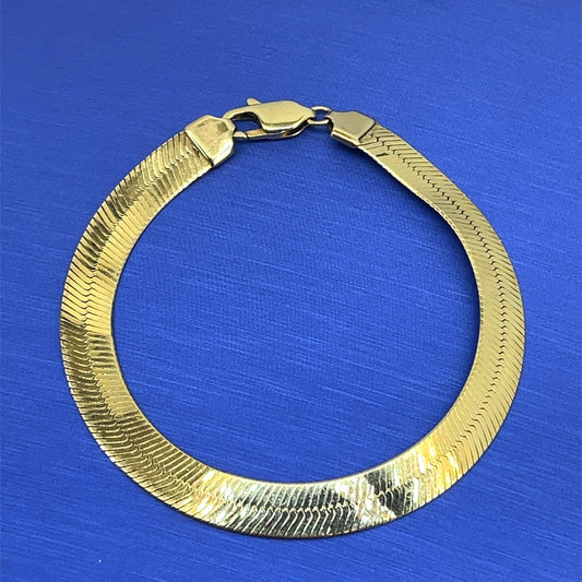 10k Yellow gold herringbone bracelet 7 inch long 7 mm wide 6.9 g0