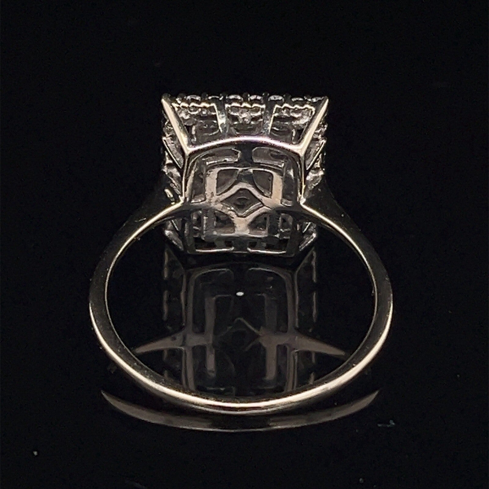 14 karat white gold rectangle diamond cluster ringG-H SI  .77 CTW size 74