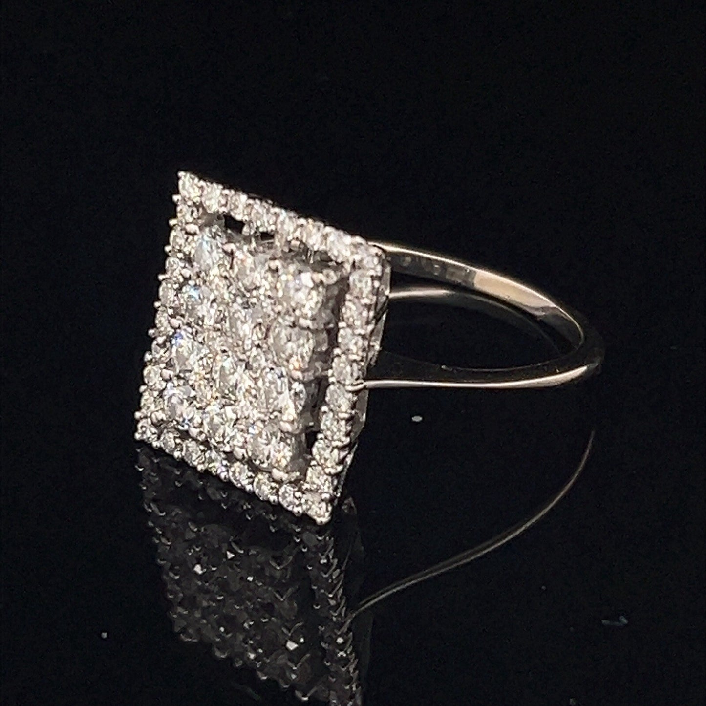 14 karat white gold rectangle diamond cluster ringG-H SI  .77 CTW size 70