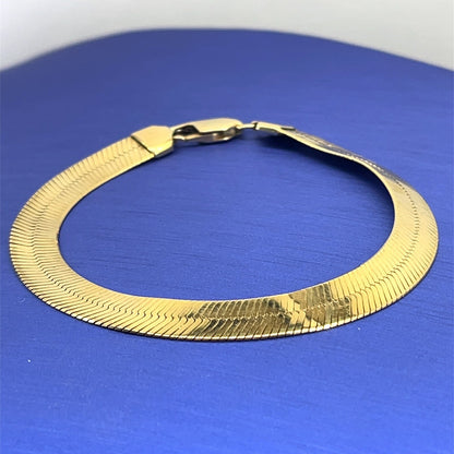 10k Yellow gold herringbone bracelet 7 inch long 7 mm wide 6.9 g2