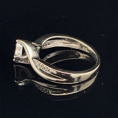 10k white gold princess and round diamond bypass style ring .30 CTW size 72