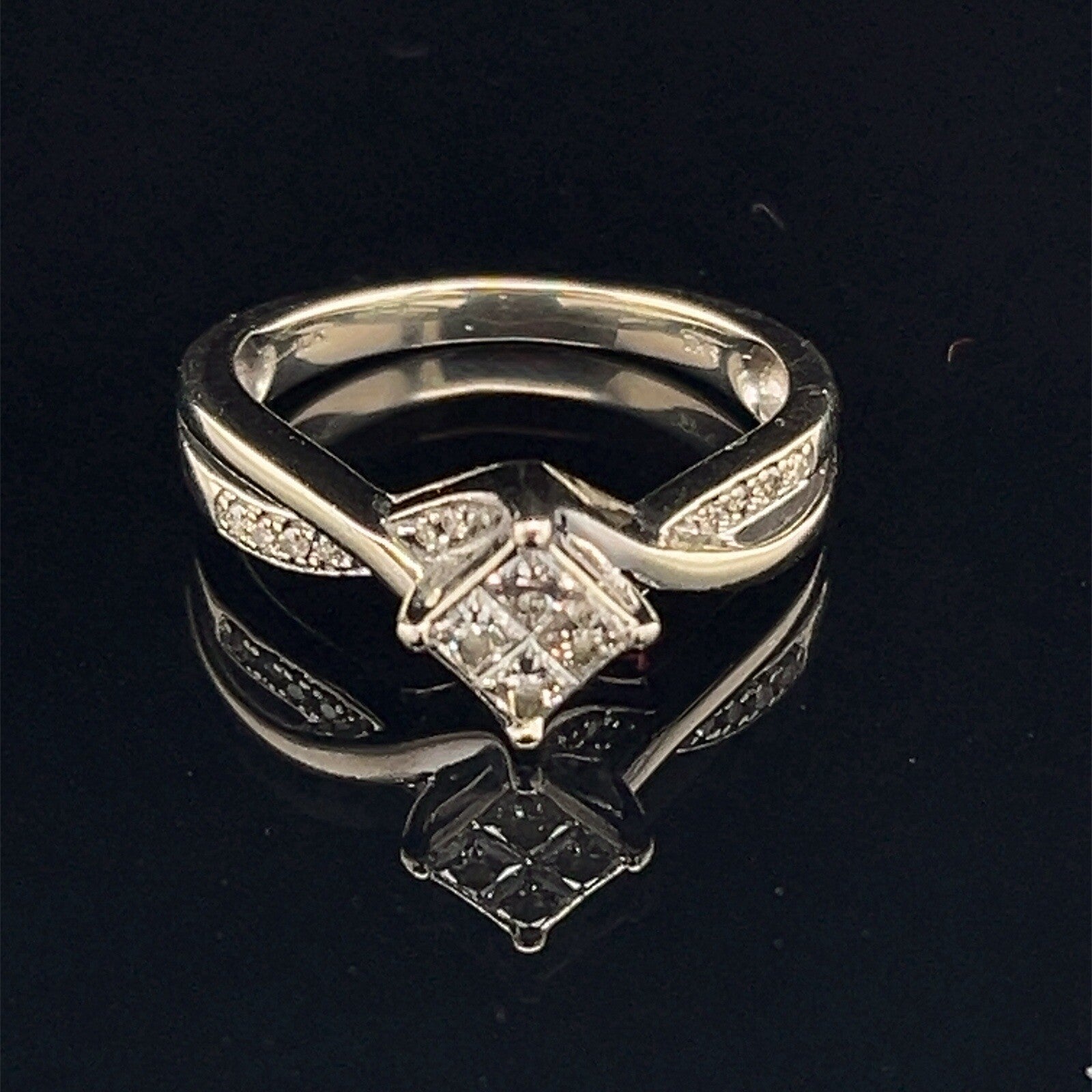 10k white gold princess and round diamond bypass style ring .30 CTW size 70